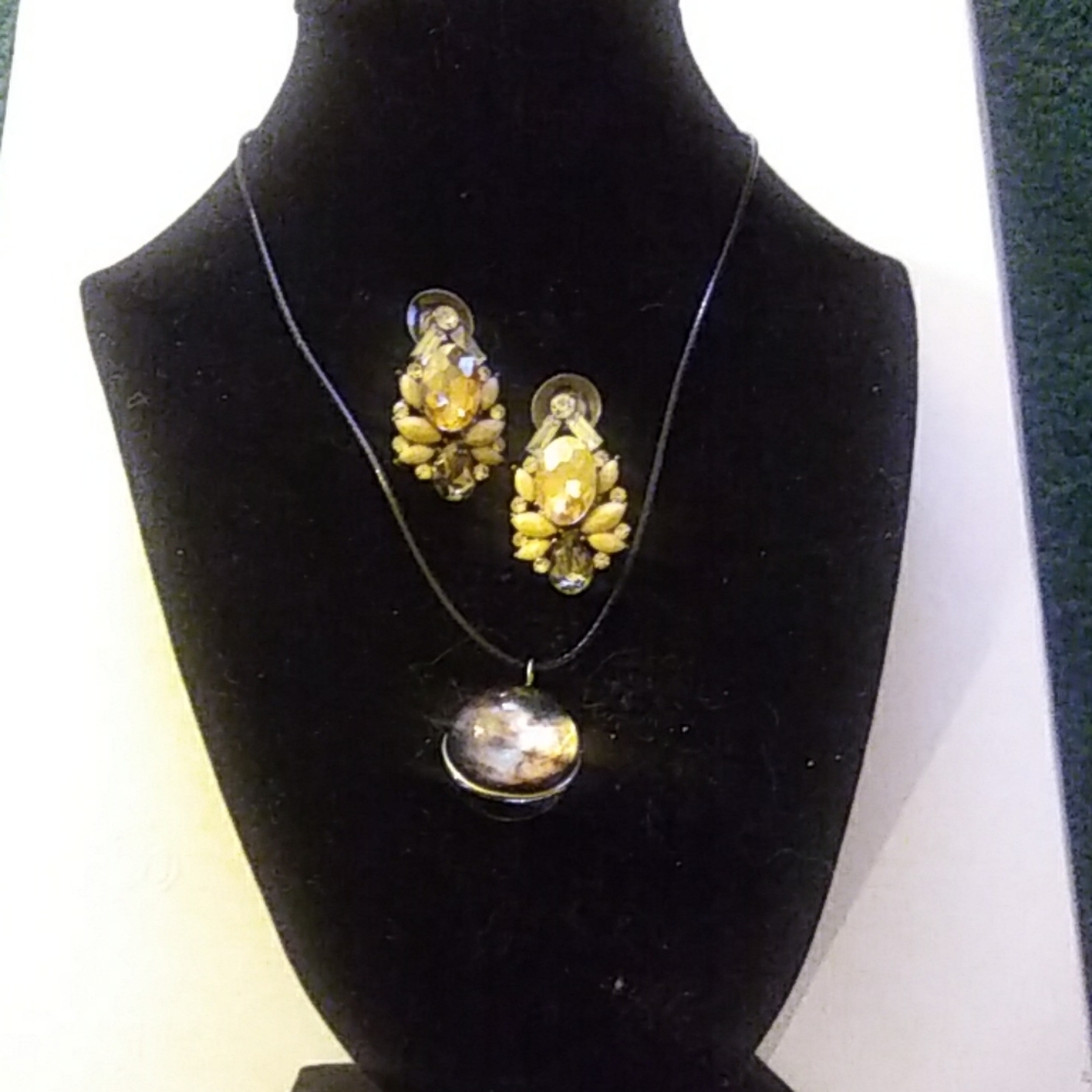 Circular Shape Necklace On Leather String With Pai - image 1